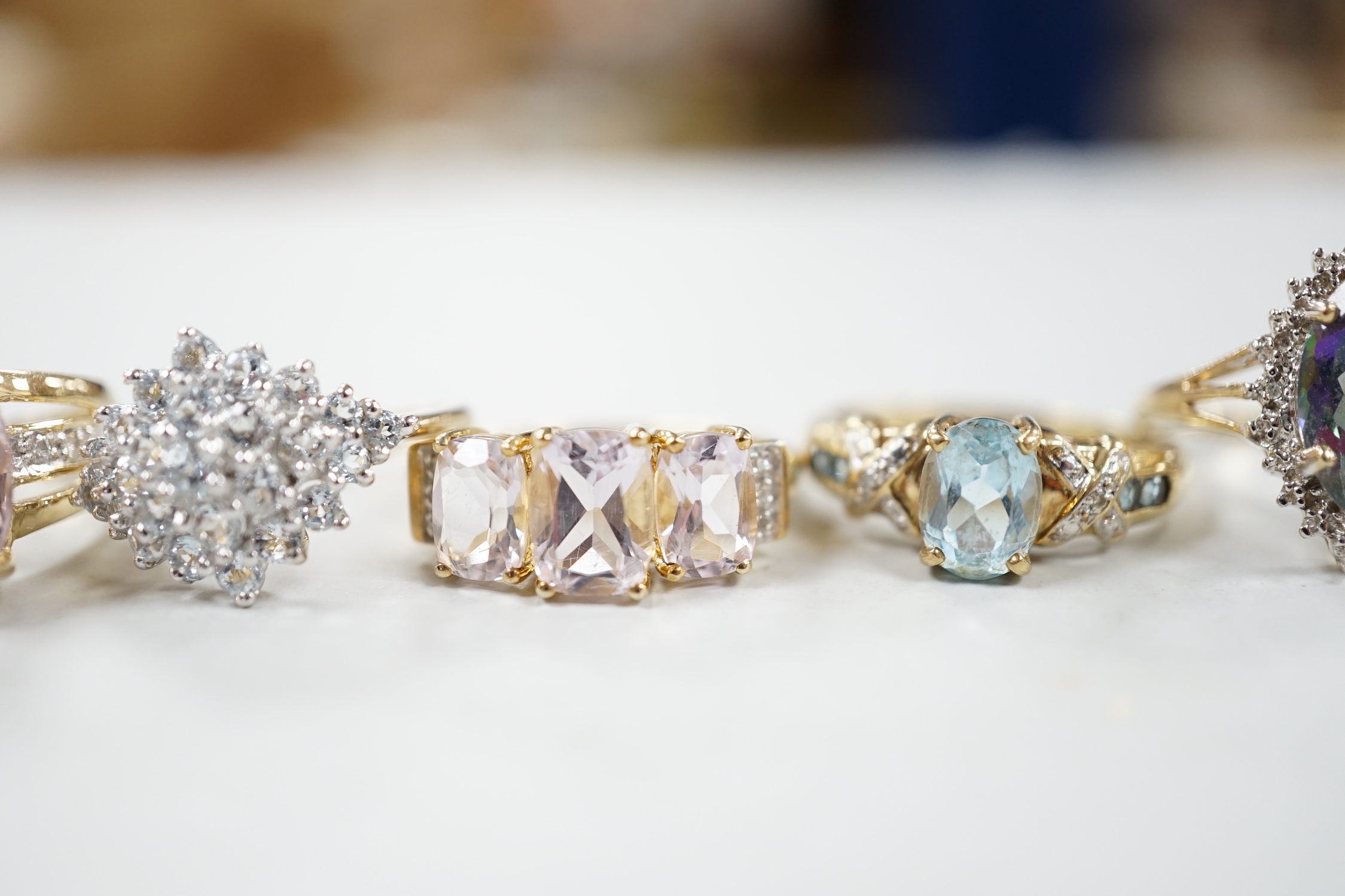 Five assorted modern 9ct gold and gen set rings, including kunzite and diamond, size N, gross 17.5 grams.